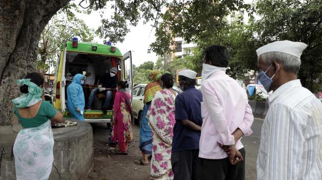 Health workers conduct thermal screenings of residents during survey in a slum near Upper Indira Nagar, Bibvewadi in Pune on Wednesday. (RAHUL RAUT/HT (FOR REPRESENTATIONAL PURPOSE ONLY)) Health workers conduct thermal screenings of residents during survey in a slum near Upper Indira Nagar, Bibvewadi in Pune on Wednesday. (RAHUL RAUT/HT (FOR REPRESENTATIONAL PURPOSE ONLY))