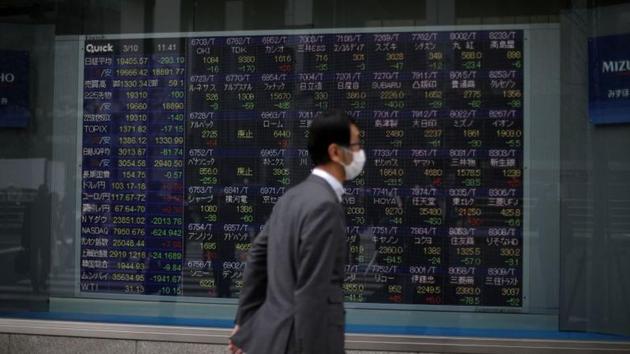 Tokyo confirmed 75 virus cases Wednesday, the first time in a week they came in below 100, only to see infections in neighbouring Saitama prefecture jump to 48. (Reuters file photo) Tokyo confirmed 75 virus cases Wednesday, the first time in a week they came in below 100, only to see infections in neighbouring Saitama prefecture jump to 48. (Reuters file photo)