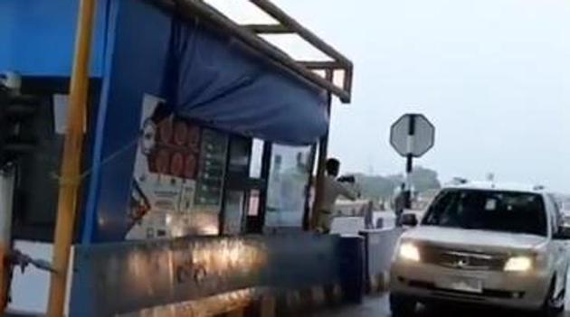 A video of three cars crossing a toll plaza early this morning shows Dubey travelling in a car different from the one that was seen flipped on the highway, which the police said was a result of a road accident. (Videograb)