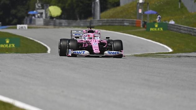 Racing Point driver Sergio Perez of Mexico steers his car during the first practice session for the Styrian Formula One Grand Prix at the Red Bull Ring racetrack in Spielberg, Austria, Friday, July 10, 2020. The Styrian F1 Grand Prix will be held on Sunday.(AP)