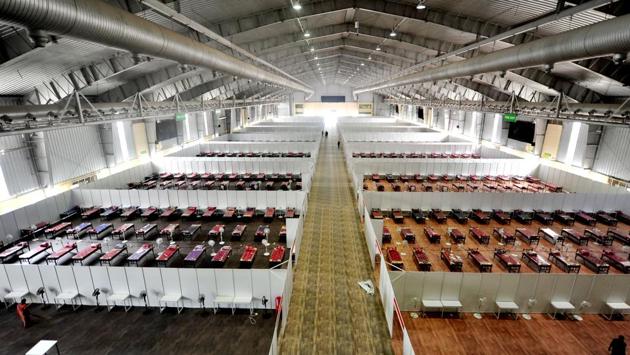 Beds are seen at a temporary COVID-19 care centre as coronavirus cases rise across the state, at Bengaluru International Exhibition Centre (BIEC) on July 6. The state reported 1,373 new Covid-19 cases on July 9, which is the city’s biggest single-day jump so far. The city’s overall tally has reached 13,882 while total number of active cases at the moment are 10,870. (ANI) Beds are seen at a temporary COVID-19 care centre as coronavirus cases rise across the state, at Bengaluru International Exhibition Centre (BIEC) on July 6. The state reported 1,373 new Covid-19 cases on July 9, which is the city’s biggest single-day jump so far. The city’s overall tally has reached 13,882 while total number of active cases at the moment are 10,870. (ANI)
