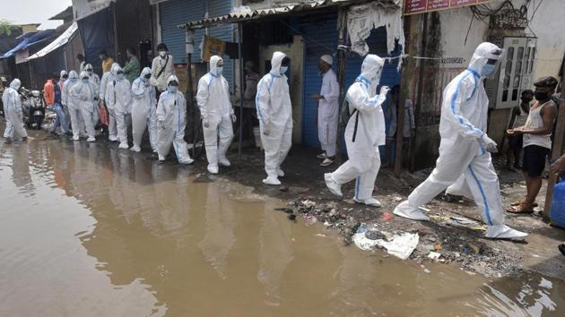 Health workers wearing PPE coveralls arrive to conduct door-to-door screenings for residents of Malad (West) in Mumbai on July 7. The government of India has said that the country has one of the lowest deaths in the world with deaths per million population at 15.31 which translates to a fatality rate of 2.75%—the global deaths per million population stands at 68.7, reported HT. (Satyabrata Tripathy / HT Photo) Health workers wearing PPE coveralls arrive to conduct door-to-door screenings for residents of Malad (West) in Mumbai on July 7. The government of India has said that the country has one of the lowest deaths in the world with deaths per million population at 15.31 which translates to a fatality rate of 2.75%—the global deaths per million population stands at 68.7, reported HT. (Satyabrata Tripathy / HT Photo)
