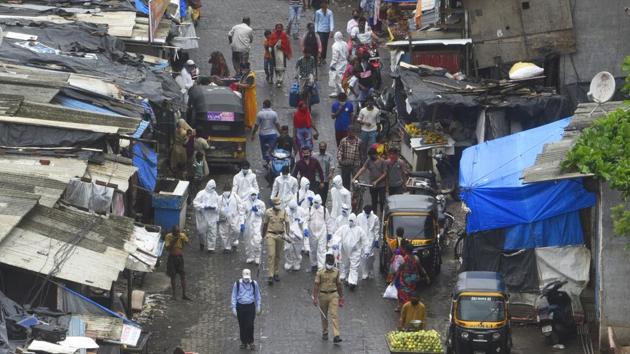 Health workers wearing personal protective equipment (PPE) carry out a medical checkup of residents of a 'containment zones' in Ambujwadi, Malad (W), a COVID-19 hotspot in Mumbai, on July 8. The Group of Ministers (GoM) was informed during a meeting on July 9 that eight states, including Maharashtra, Tamil Nadu, Delhi, Karnataka and Telangana, account for around 90 per cent of the active Covid-19 cases in the country. (Satyabrata Tripathy / HT Photo) Health workers wearing personal protective equipment (PPE) carry out a medical checkup of residents of a 'containment zones' in Ambujwadi, Malad (W), a COVID-19 hotspot in Mumbai, on July 8. The Group of Ministers (GoM) was informed during a meeting on July 9 that eight states, including Maharashtra, Tamil Nadu, Delhi, Karnataka and Telangana, account for around 90 per cent of the active Covid-19 cases in the country. (Satyabrata Tripathy / HT Photo)