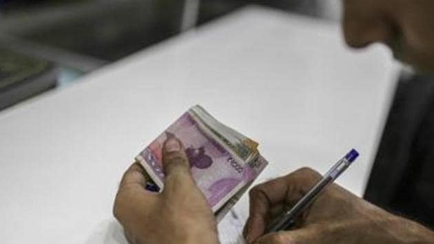 At the interbank foreign exchange market, the rupee opened weaker at 75.16 a dollar against the previous day’s close of 74.99.(Bloomberg) At the interbank foreign exchange market, the rupee opened weaker at 75.16 a dollar against the previous day’s close of 74.99.(Bloomberg)
