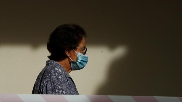 A voter wearing a face mask stands in queue at a polling station during the general election amid the coronavirus disease (COVID-19) outbreak in Singapore July 10, 2020. (Representational)(REUTERS)