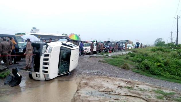 Police personnel at the encounter site where gangster Vikas Dubey was killed when he allegedly tried to escape from the spot following an accident, near Kanpur on Friday . (ANI) Police personnel at the encounter site where gangster Vikas Dubey was killed when he allegedly tried to escape from the spot following an accident, near Kanpur on Friday . (ANI)