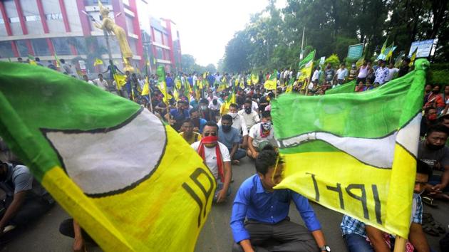 Supporters of Indigenous Peoples’ Front of Tripura (IPFT) stage a protest against the arrest of a party worker, in Khumulwng area, the headquarters of the Tripura Tribal Areas Autonomous District Council (TTAADC), on Thursday.(ANI Photo) Supporters of Indigenous Peoples’ Front of Tripura (IPFT) stage a protest against the arrest of a party worker, in Khumulwng area, the headquarters of the Tripura Tribal Areas Autonomous District Council (TTAADC), on Thursday.(ANI Photo)