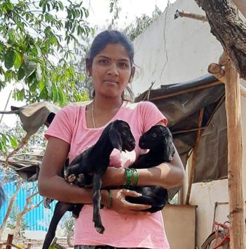 Rani Shankar with two of her goats. Her family had no income, her husband had lost his job. But when she came across a group of migrants’ children sucking on the leaves of a eucalyptus tree, she decided she had to help.