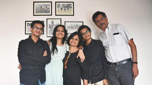 Harsh, Khushi and Anand Doshi with their parents.