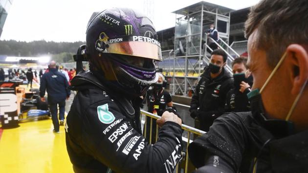 Mercedes driver Lewis Hamilton of Britain celebrates with his team after clocking a fastest time during the qualifying session for the Styrian Formula One Grand Prix at the Red Bull Ring racetrack in Spielberg, Austria, Saturday, July 11, 2020. (AP) Mercedes driver Lewis Hamilton of Britain celebrates with his team after clocking a fastest time during the qualifying session for the Styrian Formula One Grand Prix at the Red Bull Ring racetrack in Spielberg, Austria, Saturday, July 11, 2020. (AP)