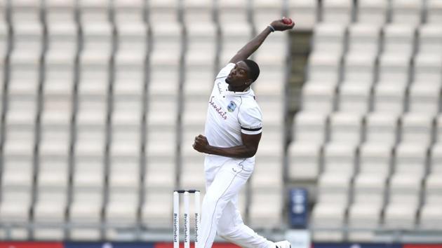 West Indies' captain Jason Holder bowls during the first day of the 1st cricket Test match between England and West Indies, at the Ageas Bowl in Southampton, England, Wednesday July 8, 2020. (Mike Hewitt/Pool via AP) (AP)