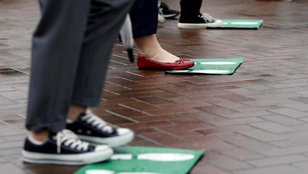 People practice social distancing as they wait. (Representational)(REUTERS)