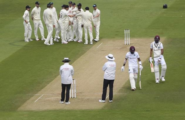 Southampton : England's James Anderson, without cap, celebrates with teammates the dismissal of West Indies' Shamarh Brooks during the third day of the first cricket Test match between England and West Indies, at the Ageas Bowl in Southampton, England, Friday, July 10, 2020. AP/PTI(AP10-07-2020_000201A) (AP)