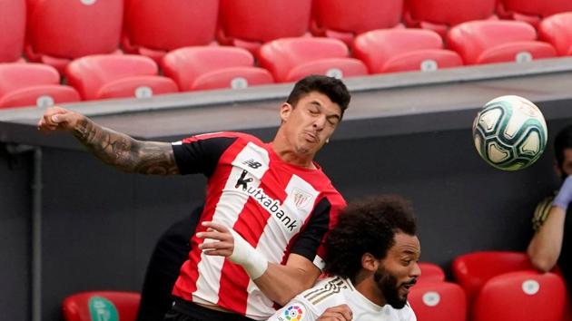 FILE PHOTO: Soccer Football - La Liga Santander - Athletic Bilbao v Real Madrid - San Mames, Bilbao, Spain - July 5, 2020 Athletic Bilbao's Ander Capa in action against Real Madrid's Marcelo as play resumes behind closed doors following the outbreak of the coronavirus disease (COVID-19) REUTERS/Vincent West/File Photo(REUTERS)
