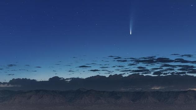 Comet NEOWISE soars in the horizon of the early morning sky seen from near the grand view lookout at the Colorado National Monument west of Grand Junction, Colorado.(AP)