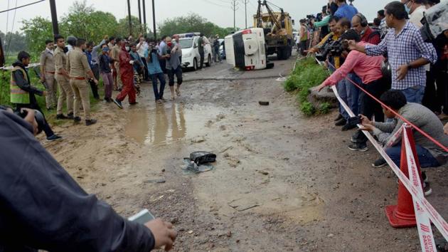 Police and media at the encounter site where gangster Vikas Dubey was killed when he allegedly tried to escape from the spot following an accident, near Kanpur. (PTI) Police and media at the encounter site where gangster Vikas Dubey was killed when he allegedly tried to escape from the spot following an accident, near Kanpur. (PTI)
