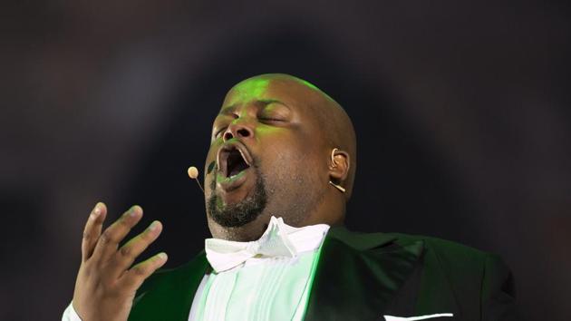 South African baritone singer Siyabulela Ntlale performs during the rehearsal of the Cathedral Steps open air festival (Domstufen-Festspiele) in front of the Mariendom (Cathedral of Mary) and the St. Severi's Church in Erfurt, Germany, Wednesday, July 8, 2020. (AP) South African baritone singer Siyabulela Ntlale performs during the rehearsal of the Cathedral Steps open air festival (Domstufen-Festspiele) in front of the Mariendom (Cathedral of Mary) and the St. Severi's Church in Erfurt, Germany, Wednesday, July 8, 2020. (AP)
