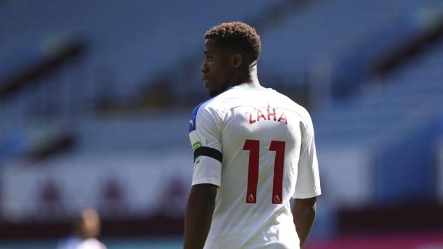 Crystal Palace's Wilfried Zaha reacts during the English Premier League soccer match between Aston Villa and Crystal Palace at Villa Park in Birmingham, England, Sunday, July 12, 2020. (Catherine Ivill/Pool Photo via AP)(AP)