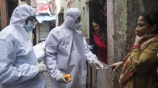 Municipal health care workers check the temperature and blood oxygen levels of residents in Mumbai’s Dharavi on July 10. Maharashtra, Tamil Nadu, Delhi, Karnataka and Uttar Pradesh are among states with high caseload of Covid-19 and major contributors to the high daily spikes in caseload. (Satish Bate / HT Photo) Municipal health care workers check the temperature and blood oxygen levels of residents in Mumbai’s Dharavi on July 10. Maharashtra, Tamil Nadu, Delhi, Karnataka and Uttar Pradesh are among states with high caseload of Covid-19 and major contributors to the high daily spikes in caseload. (Satish Bate / HT Photo)