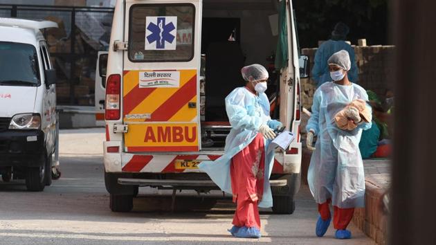 Health workers seen outside the COVID-19 ward at LNJP hospital in New Delhi on July 10. There are currently 292,258 active cases of the viral disease in the country. The recovery rate stands at 62.92% as of July 12. (Sonu Mehta / HT Photo) Health workers seen outside the COVID-19 ward at LNJP hospital in New Delhi on July 10. There are currently 292,258 active cases of the viral disease in the country. The recovery rate stands at 62.92% as of July 12. (Sonu Mehta / HT Photo)