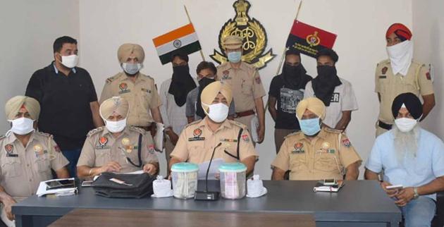 Additional deputy commissioner of police (ADCP-2) Jaskiranjit Singh Teja addressing a press conference about the arrests in Ludhiana on Saturday.(HT Photo)