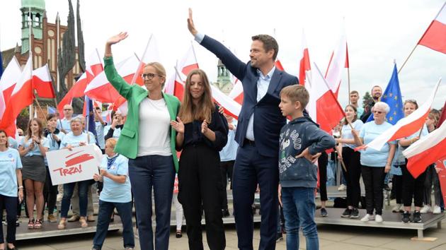 Mayor of Warsaw and the presidential candidate of the main Polish opposition party Civic Platform (PO) Rafal Trzaskowski and his wife Malgorzata and children Aleksandra and Stanislaw attend an election campaign rally in Szczecin, Poland. (via REUTERS) Mayor of Warsaw and the presidential candidate of the main Polish opposition party Civic Platform (PO) Rafal Trzaskowski and his wife Malgorzata and children Aleksandra and Stanislaw attend an election campaign rally in Szczecin, Poland. (via REUTERS)