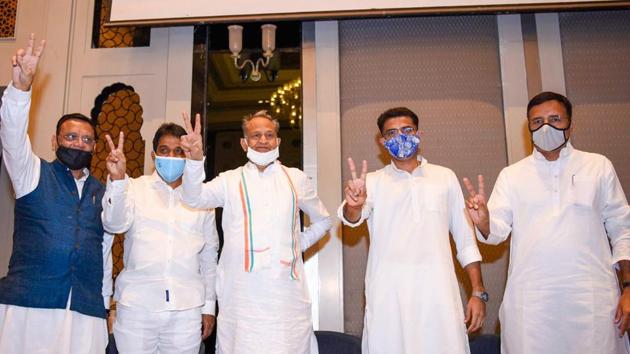 From left- AICC general secretary Avinash Pandey, party's Rajya Sabha candidate KC Venugopal, Rajasthan chief minister Ashok Gehlot, Deputy CM Sachin Pilot and party leader Randeep Surjewala show victory sign during a press conference in Jaipur.(PTI)