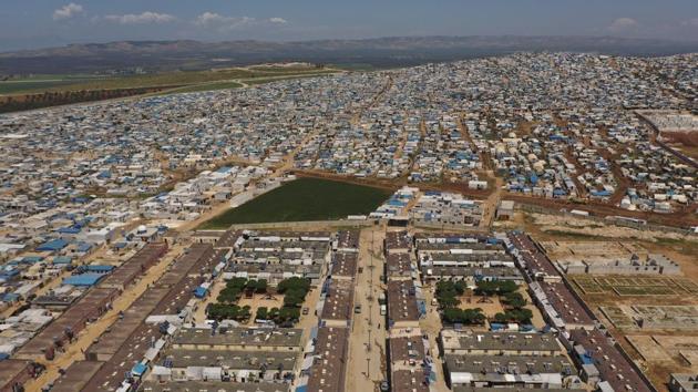 FILE - In this April 19, 2020 photo file photo, shows a large refugee camp on the Syrian side of the border with Turkey, near the town of Atma, in Idlib province, Syria.(AP) FILE - In this April 19, 2020 photo file photo, shows a large refugee camp on the Syrian side of the border with Turkey, near the town of Atma, in Idlib province, Syria.(AP)