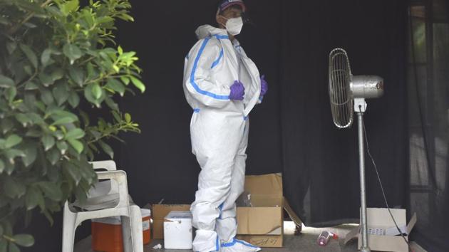 A health worker cools himself during a swab sample collection in New Delhi on July 11. According to worldometers, India ranks third in the list of countries worst affected by Covid-19. Only the United States and Brazil fare worse, occupying the first and second spots respectively. And while these nations are equally worse hit in terms of fatalities, India with a far larger population, ranks 8th --relatively lower in comparison. (Sonu Mehta / HT Photo) A health worker cools himself during a swab sample collection in New Delhi on July 11. According to worldometers, India ranks third in the list of countries worst affected by Covid-19. Only the United States and Brazil fare worse, occupying the first and second spots respectively. And while these nations are equally worse hit in terms of fatalities, India with a far larger population, ranks 8th --relatively lower in comparison. (Sonu Mehta / HT Photo)