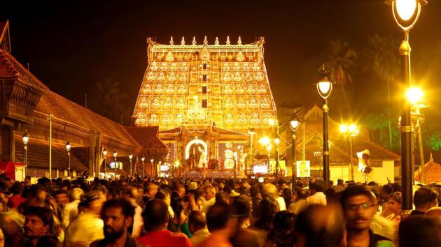 Devotees came out in large numbers and distributed sweets before the sixth century temple, situated in the heart of the state capital Thiruvananthapuram. Some devotees were even seen crying before the temple. (Photo: Vivek R Nair/HT)