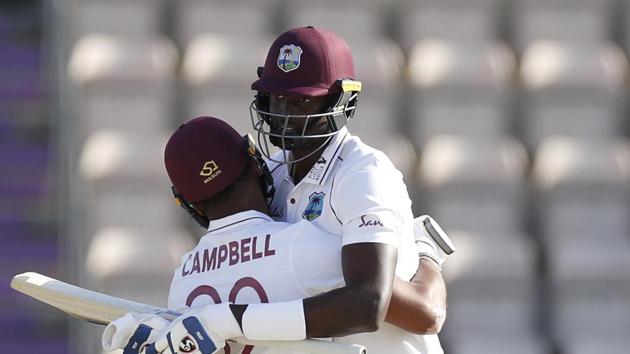 Southampton : West Indies captain Jason Holder, right, hugs teammate John Campbell after their win on the fifth day of the first cricket Test match between England and West Indies, at the Ageas Bowl in Southampton, England, Sunday, July 12, 2020. AP/PTI(AP12-07-2020_000274A) (AP) Southampton : West Indies captain Jason Holder, right, hugs teammate John Campbell after their win on the fifth day of the first cricket Test match between England and West Indies, at the Ageas Bowl in Southampton, England, Sunday, July 12, 2020. AP/PTI(AP12-07-2020_000274A) (AP)