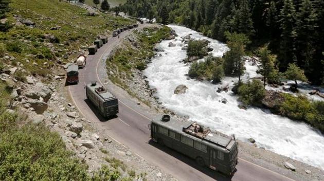 An Indian Army convoy moves along a highway leading to Ladakh, at Gagangeer in Kashmir's Ganderbal district on June 18, 2020.(Reuters File Photo)