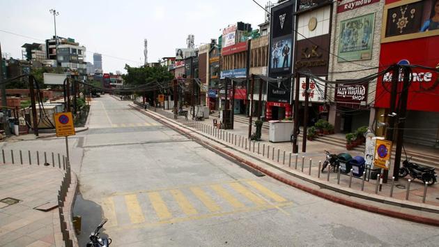 A deserted view of Noida sector-18 market during the total lockdown imposed by the state government for three consecutive days due to surge in Covid-19 cases, in Noida. (ANI) A deserted view of Noida sector-18 market during the total lockdown imposed by the state government for three consecutive days due to surge in Covid-19 cases, in Noida. (ANI)