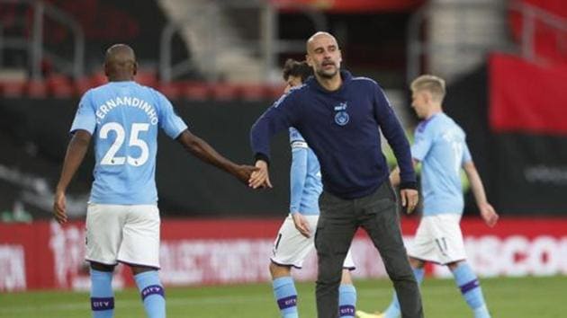 Manchester City manager Pep Guardiola and Fernandinho after the match. (REUTERS) Manchester City manager Pep Guardiola and Fernandinho after the match. (REUTERS)