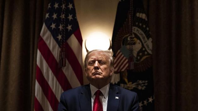 US President Donald Trump listens during a roundtable meeting before a White House Hispanic Prosperity Initiative executive order signing ceremony at the White House in Washington, DC.(Bloomberg) US President Donald Trump listens during a roundtable meeting before a White House Hispanic Prosperity Initiative executive order signing ceremony at the White House in Washington, DC.(Bloomberg)