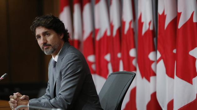Justin Trudeau, Canada's prime minister, listens during a news conference in Ottawa, Ontario, Canada.(Bloomberg)