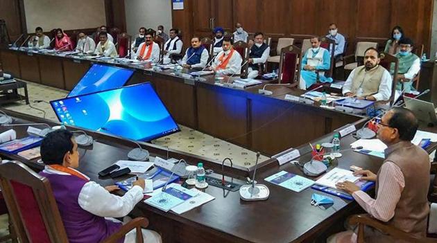 Madhya Pradesh CM Shivraj Singh Chouhan holds a meeting after the state cabinet expansion in Bhopal on July 2. (PTI Photo) Madhya Pradesh CM Shivraj Singh Chouhan holds a meeting after the state cabinet expansion in Bhopal on July 2. (PTI Photo)