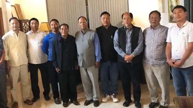 Seven rebel MLAs of the NPF with Nagaland chief minister Neiphiu Rio (third from right) (HT File Photo) Seven rebel MLAs of the NPF with Nagaland chief minister Neiphiu Rio (third from right) (HT File Photo)