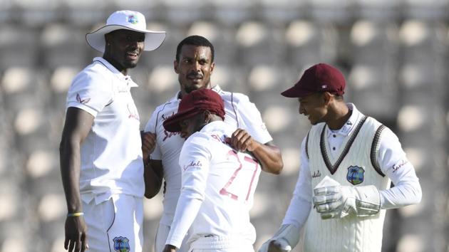 West Indies' Shannon Gabriel, second left, celebrates with teammates the dismissal of England's Ollie Pope during the fourth day of the first cricket Test match between England and West Indies, at the Ageas Bowl in Southampton, England, Saturday, July 11, 2020. (Mike Hewitt/Pool via AP)(AP)