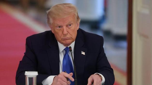 US president Donald Trump hosts a roundtable event celebrating law enforcement in the East Room of the White House in Washington on July 13, 2020.(REUTERS)