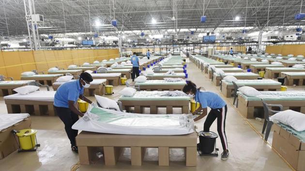 Cardboard beds being prepared during the inauguration of the Radha Soami Satsang Beas Covid Care Centre by Lt Gov Anil Baijal in Chhatarpur, New Delhi on July 5, 2020. (Vipin Kumar/HT Photo) Cardboard beds being prepared during the inauguration of the Radha Soami Satsang Beas Covid Care Centre by Lt Gov Anil Baijal in Chhatarpur, New Delhi on July 5, 2020. (Vipin Kumar/HT Photo)