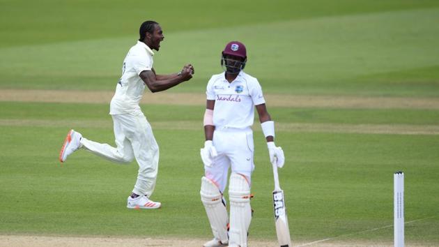 England's Jofra Archer celebrates taking the wicket of West Indies' Shamarh Brooks, as play resumes behind closed doors following the outbreak of the coronavirus disease (COVID-19).(REUTERS)