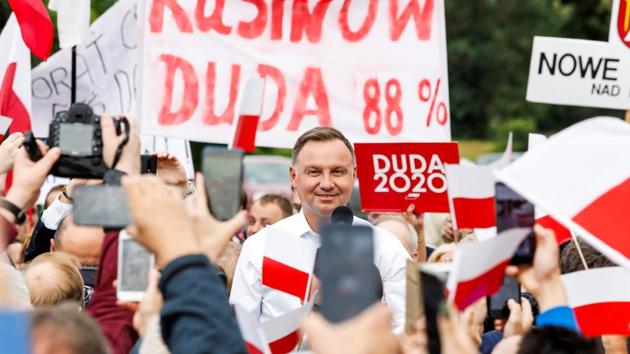 Polish President Andrzej Duda attends a meeting with local residents following his victory in a presidential election in Odrzywol, Poland(via REUTERS)