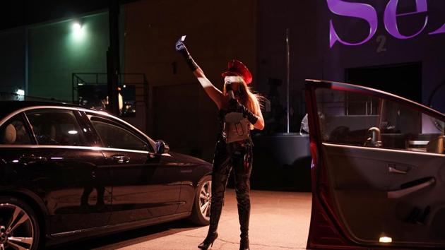 Gabriella Versace emcees at "SEXXY: The Show" at an outdoor drive-in venue Friday, July 3, 2020, in Las Vegas. The producers and performers held the show over a few nights at the outdoor venue to raise money for charities while their regular showroom at the Westgate Las Vegas resort and casino was closed due to the coronavirus. (AP)