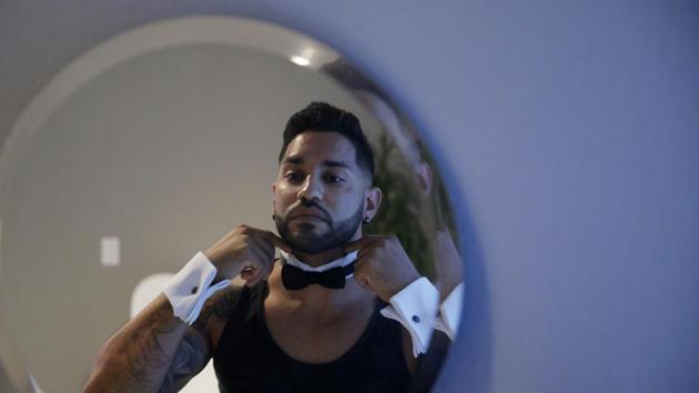 Chippendales dancer Miguel Rivera prepares for a virtual Zoom party from his home Friday, June 19, 2020, in Las Vegas. Rivera is one of a few Chippendale dancers doing virtual shows while the live show is shut down due to the coronavirus. (AP)