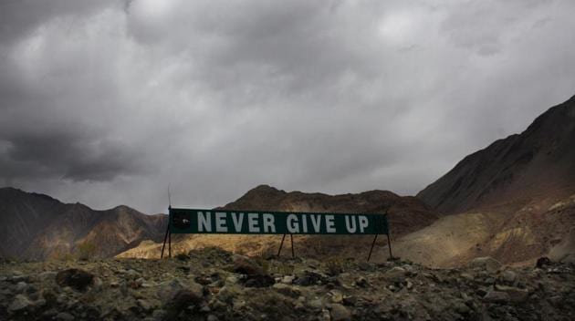 A banner erected by the Indian army stands near Pangong Tso lake near the India China border in India's Ladakh area.(AP)