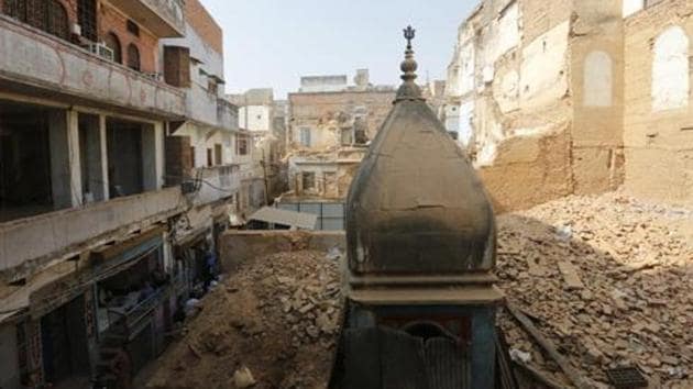 Around 60 temples were found in the vicinity of famous Kashi Vishwanath temple after demolition work began for creation of a corridor in the area in 2018.(AP Photo/File) Around 60 temples were found in the vicinity of famous Kashi Vishwanath temple after demolition work began for creation of a corridor in the area in 2018.(AP Photo/File)