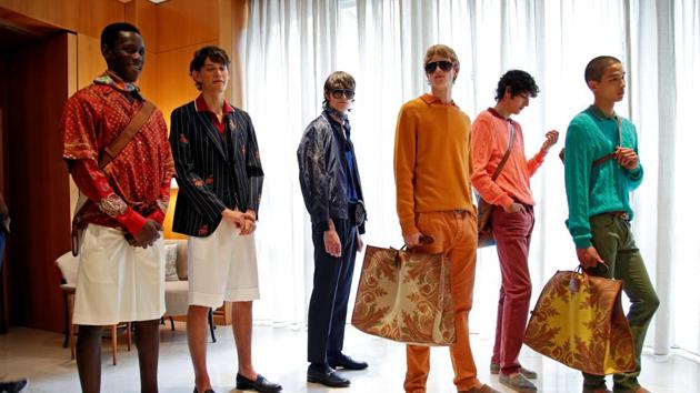 Models are seen at the backstage of the Etro Spring/Summer 2021 Men's collection and Women's pre-collection livestreamed show at the Four Seasons hotel, amid the coronavirus disease (COVID-19) outbreak, during Milan Digital Fashion Week in Milan, Italy, July 15, 2020. (REUTERS)
