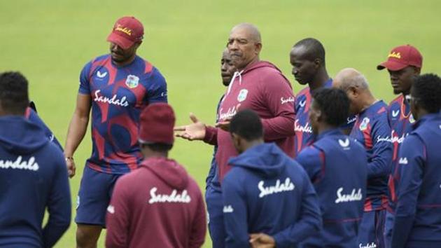 Southampton : West Indies coach Phil Simmons, centre, speaks to his team members during a nets session at the Ageas Bowl in Southampton, England, Tuesday July 7, 2020. West Indies play their first Test match against England on upcoming July 8-12.(AP)