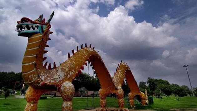 A dragon statue against the backdrop of an overcast sky at the Japanese Garden in Sector 31, Chandigarh, on Thursday.(Keshav Singh/HT)